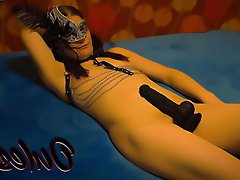 A stylish and sensual woman of a certain age is flirting with her spouse.