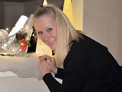 Hot MILF Tia posing in pink underwear for a photo session